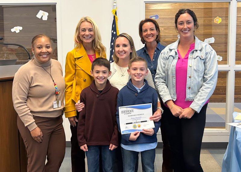 H.O. Britingham Elementary school nurse Karen Neuwirth receives the Cape district’s Going the Extra Mile staff award for October. Shown are (l-r) Yvette Davenport, HOB principal; Dr. Jenny Nauman, Cape superintendent; Neuwirth; Alison Myers, school board president; and Julie Hickman, HOB assistant principal. In front are Liam Neuwirth and Parker Neuwirth. SUBMITTED PHOTOS
